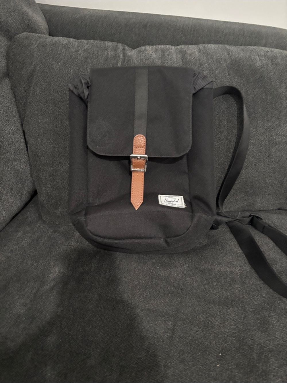 Herschel Supply Company Retreat sling Black with Brown Leather Strap (medium)